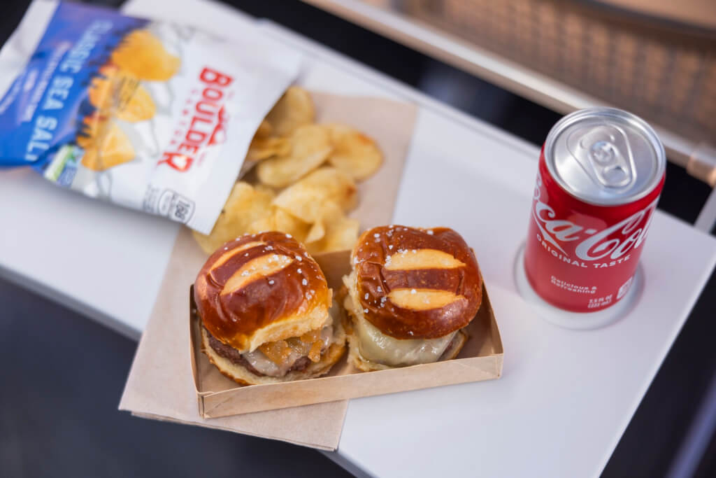 Hot Meals Return to Alaska Air Main Cabin - Pretzel Roll with Chips