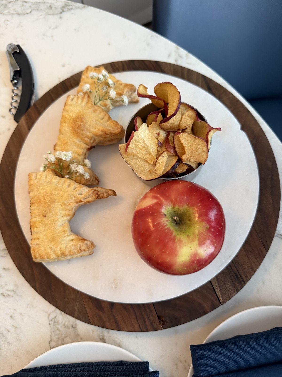 Minnesota-shaped welcome pastries with apple and apple chips